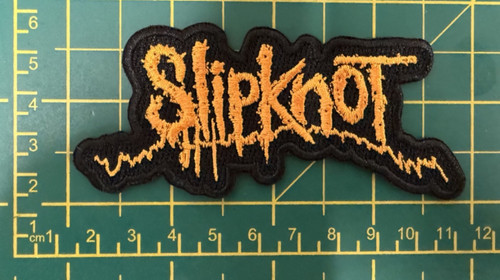 Slipknot orange cut out woven - slipknot,